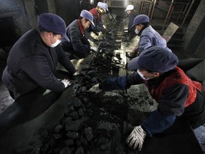 HD Mining has arranged for 201 Chinese workers to receive temporary visas. (Reuters)