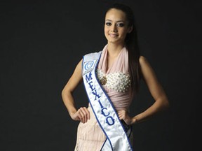 In this April 26, 2012 photo, Maria Susana Flores Gamez poses for a photo for a story about her upcoming participation in a beauty pageant in China, in Culiacan, Mexico. Flores, who was voted the 2012 Woman of Sinaloa in a beauty pageant in February, was killed in northern Mexico on Nov. 24, 2012 during a running gun battle between soldiers and the gang of drug traffickers she was traveling with. (AP Photo/El Debate, Gladys Serrano)