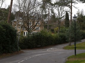 Granville Road on the St. George's Hill private estate, where Russian businessman Alexander Perepilichnyy collapsed on November 10, is seen near Weybridge in Surrey November 28, 2012. A Russian businessman helping Swiss prosecutors uncover a powerful fraud syndicate has died in mysterious circumstances outside his mansion in Britain, in a chilling twist to a Russian mafia scandal that has strained Moscow's ties with the West. (Olivia Harris / Reuters)