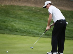 Webb Simpson has already begun to use a shorter putter while practising and says he will make the full-time switch from the long putter when he is comfortable. (Lucy Nicholson/Reuters)