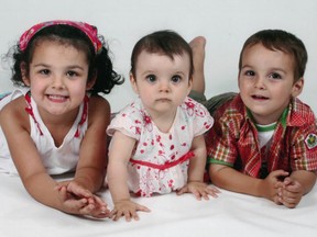 Laurélie, 5, Anaïs, 2, and Loïc Desautels, 4, are shown in a family photo released on Monday December 3, 2012. (Handout / CP)