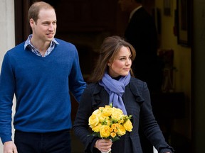 Britain's Prince WiIliam, the Duke of Cambridge, (L) and his wife Catherine, Duchess of Cambridge, leave the King Edward VII hospital in central London, on December 6, 2012. Prince William's pregnant wife Catherine left a London hospital on Thursday, four days after she was admitted for treatment for acute morning sickness. AFP PHOTO/Leon NealLEON NEAL/AFP/Getty Images