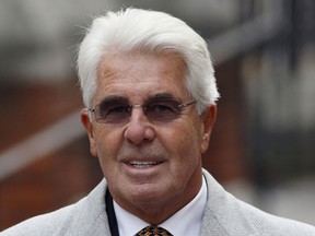 British publicist Max Clifford poses for photographers as he arrives at the Royal Courts of Justice to give evidence at the Leveson Inquiry into press standards in London. British police have arrested top publicist Max Clifford on suspicion of sexual offences, it was widely reported. Police confirmed they had arrested a man in his 60s under Operation Yewtree, an investigation into sex offences sparked by allegations that late BBC presenter Jimmy Savile was a serial paedophile. (Justin Tallis / AFP / Getty Images)