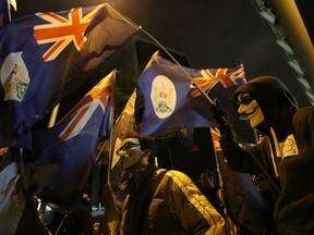 AARON TAM / AFP / Getty Images