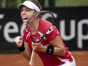 Canadian tennis player Sharon Fichman celebrates after defeating Catalina Castano of Colombia in Medellin on Friday.