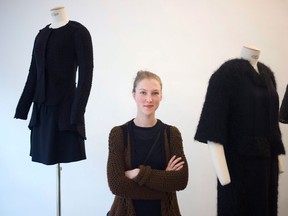 French fashion designer Alice Lemoine poses among her creations as part of the presentation of Le Moine Tricote's ready-to-wear Fall/Winter 2013-2014 collection. (Thibault Camus/AP Photo)