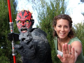 Toronto-area Lego enthusiast Jennifer Good (right) poses with Lego Death Maul (left), one of many Lego-themed exhibits at LEGOLAND in Winter Haven, Fla.