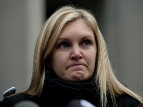 Christine Russell speaks to media outside University Courthouse in Toronto, Ontario, after Richard Kachkar was found not criminally responsible for killing Sgt. Ryan Russell Wednesday, March 27, 2013.