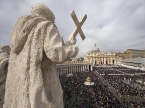 Faithful gather in St. Peter's Square at the Vatican on March 24.