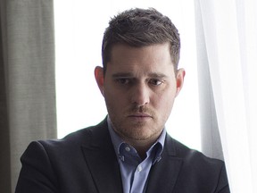 Canadian singer Michael BublÈ, who will host the 2013 Juno Awards, poses for a photo to promote the upcoming release of his record "To Be Loved" in Toronto on Monday, March 4, 2013. THE CANADIAN PRESS/Michelle Siu