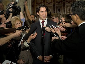 Justin Trudeau speaks to reporters.