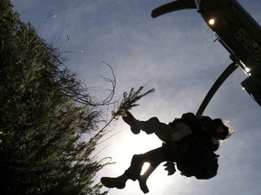 Deputy Doug Cramoline / L.A. County Search and Rescue Reserve / The Associated Press