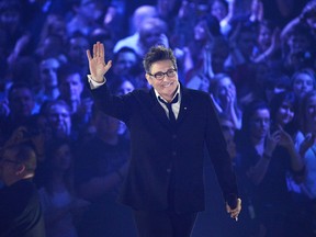 k.d. lang waves to the crod after receiving a Juno for her Canadian Music Hall of Fame induction during the 2013 Juno Awards in Regina on Sunday, April 21, 2013. THE CANADIAN PRESS/Liam Richards