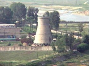 FILE - In this June 27, 2008 file photo from television, the 60-foot-tall cooling tower is seen before its demolition at the main Nyongbyon reactor complex in Nyongbyon, also known as Yongbyon, North Korea. North Korea vowed Tuesday, April 2, 2013, to restart a nuclear reactor that can make one bomb's worth of plutonium a year, escalating tensions already raised by near daily warlike threats against the United States and South Korea. The North's plutonium reactor was shut down in 2007 as part of international nuclear disarmament talks that have since stalled. The declaration of a resumption of plutonium production — the most common fuel in nuclear weapons — and other facilities at the main Nyongbyon nuclear complex will boost fears in Washington and among its allies about North Korea's timetable for building a nuclear-tipped missile that can reach the United States, technology it is not currently believed to have. (AP Photo/APTN, File)