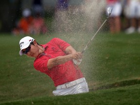 IRVING, TX - MAY 18:  John Huh hits out of a sand trap during the third round of the 2013 HP Byron Nelson Championship at the TPC Four Seasons Resort on May 18, 2013 in Irving, Texas.  (Photo by Tom Pennington/Getty Images)