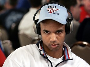This is a Saturday, July, 9, 2005 file photo of Phil Ivey as he waits for the next deal in the World Series of Poker at the Rio Hotel and Casino in Las Vegas. A casino group has Ivey of cheating at baccarat and says the alleged scam means they don't have to pay his claimed multimillion dollar winnings.