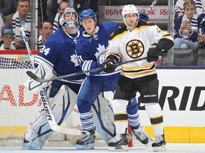 TORONTO, CANADA - MAY 6:  Rich Peverley #49 of the Boston Bruins battles against Jake Gardiner #51 of the Toronto Maple Leafs in Game Three of the Eastern Conference Quarterfinals during the 2013 Stanley Cup Playoffs on May 6, 2013 at the Air Canada Centre in Toronto, Ontario, Canada. (Photo by Claus Andersen/Getty Images)