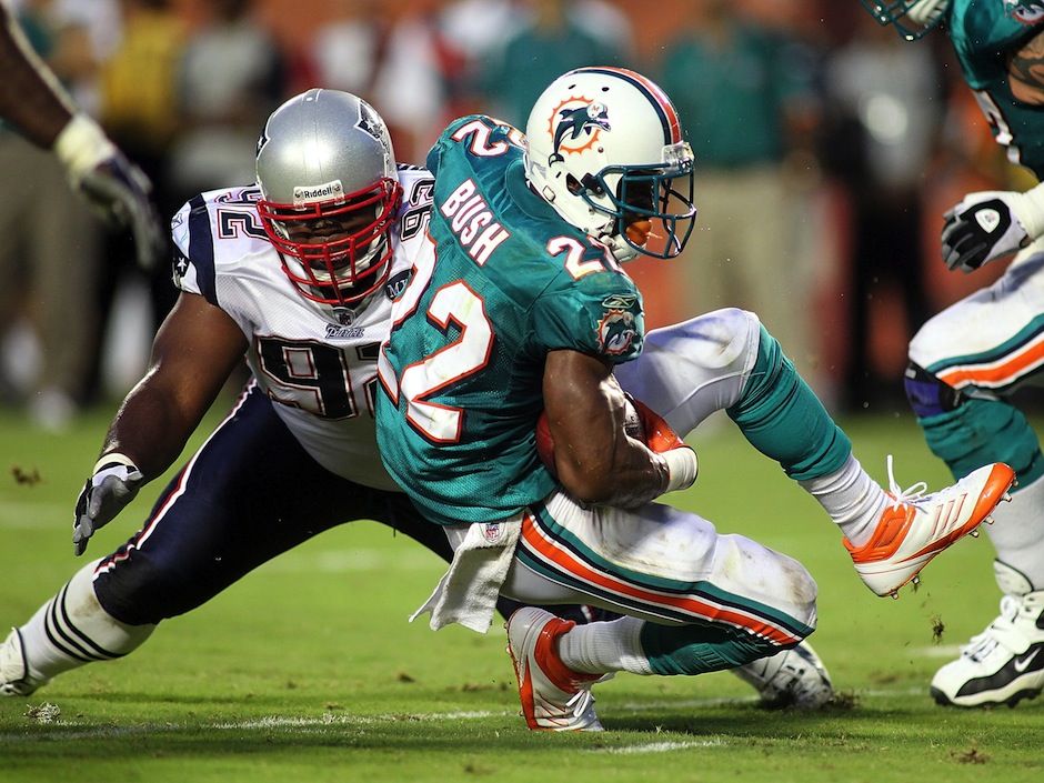 Reggie Bush of the New Orleans Saints carries the ball against the