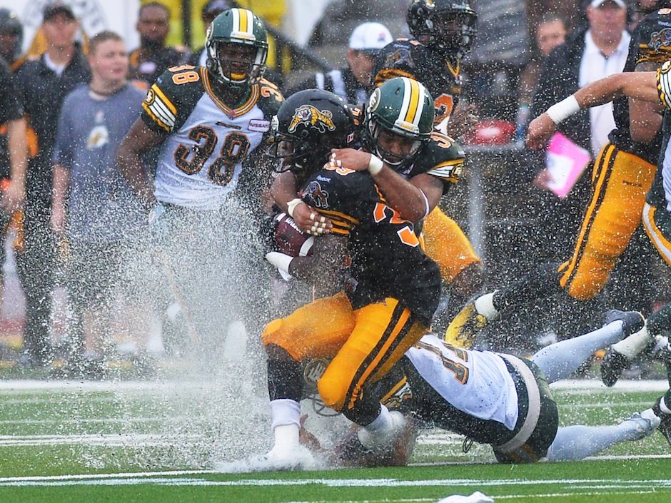 Edmonton Eskimos spoil Hamilton Tiger-Cats' home opener on soaked