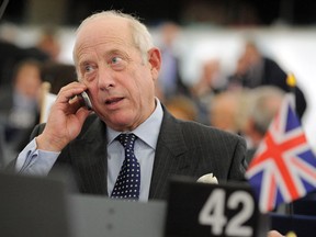 Local Input~ Britain's United Kingdom Independence Party (UKIP) and member of the European Parliament Godfrey Bloom is pictured as he gives a phone call before his exclusion, at the European Parliament in Strasbourg, eastern France, on November 24, 2010. AFP PHOTO / FREDERICK FLORIN (Photo credit should read FREDERICK FLORIN/AFP/Getty Images) ORG XMIT: -