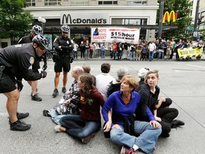 AP Photo/Elaine Thompson