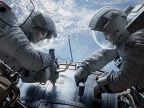 Sandra Bullock and George Clooney in Gravity.
