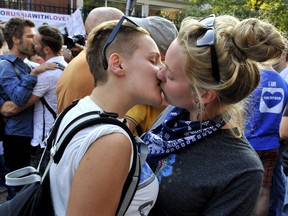 Gay couples participate in a  'Kiss-In' action at the Russian consulate in Antwerp, Belgium.
GEORGES GOBET / AFP / Getty Images
