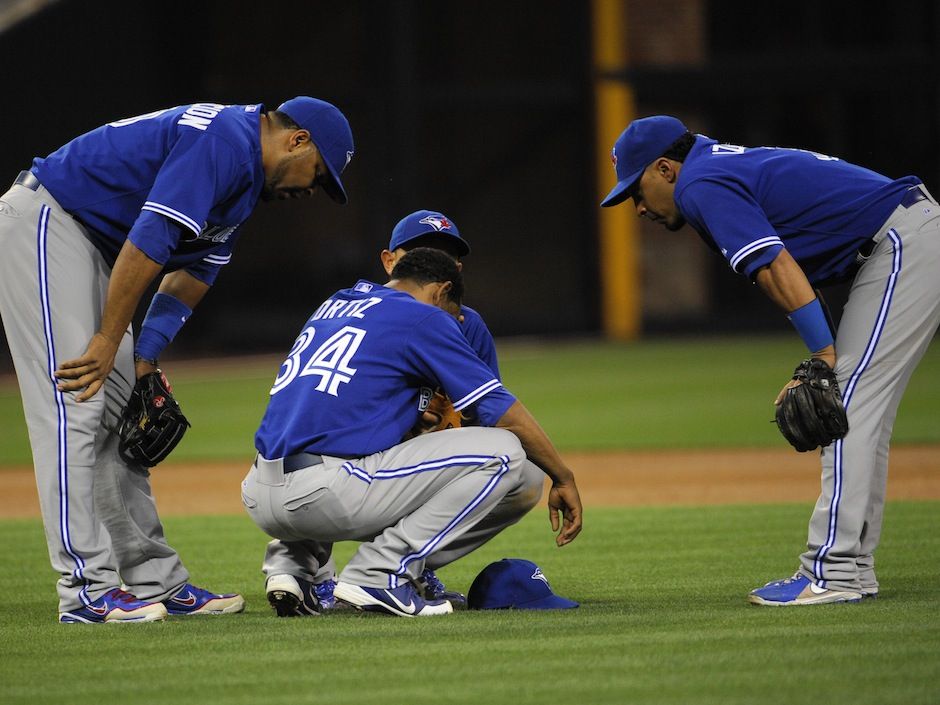 Emotional Jays pitcher Ramon Ortiz suffers apparent elbow injury