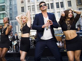 Robin Thicke performs on NBC's "Today" show on Tuesday, July 30, 2013 in New York. (Photo by Charles Sykes/Invision/AP)