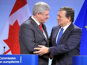 European Commission President Jose Manuel Barroso shakes hand with Prime Minister Stephen Harper after a signing ceremony to finalize a Canada-E.U. free-trade accord more than four years in the making.        AFP PHOTO / GEORGES GOBETGEORGES GOBET/AFP/Getty Images