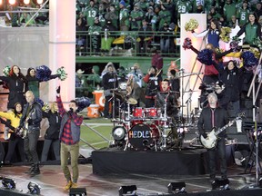 REGINA, SK: NOVEMBER 24, 2013 – The Canadian pop-rock group Hedley performs during half-time at the 101st Grey Cup at Mosaic Stadium in Regina on November 24, 2013. (Bryan Schlosser / Leader-Post) (Story by Murray McCormick) (SPORTS)