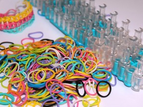 A Rainbow Loom and rubber bands.