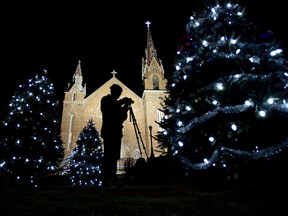 Christmas trees in front of a church in Quebec.