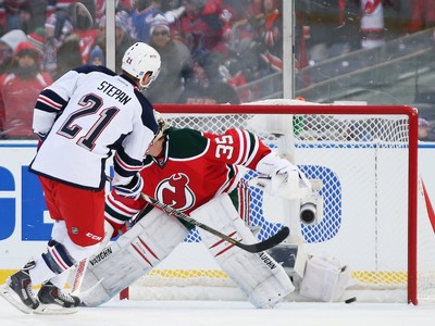 Rangers use four-goal second period to beat Devils 7-3 at Yankee Stadium