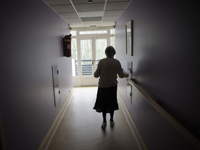 An Alzheimer's patient wanders the halls of a nursing home in a file photo.