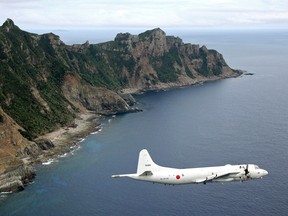 AP Photo/Kyodo News, File