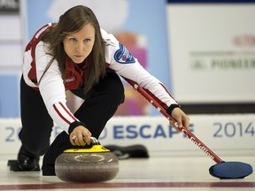 Team Canada skip Rachel Homan takes a shot during her match against Saskatchewan at the Scotties Tournament of Hearts draw fifteen curling action Thursday, February 6, 2014 in Montreal.THE CANADIAN PRESS/Ryan Remiorz