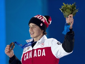 In this Feb. 8, 2014 file photo, Mark McMorris celebrates his bronze medal for snowboard slopestyle at the Sochi Olympics.