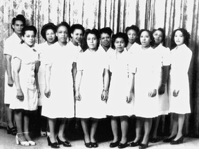 An undated archival photo of Viola Desmond, front left, with the graduating class of The Desmond Studio of Beauty Culture, 1947. Viola Desmond is on the far left of the front row. In 1946 Desmond was arrested and jailed for sitting in the whites-only section of a local cinema. Nova Scotia's new, as-yet-unnamed holiday will honour a different prominent historic Nova Scotian each year, beginning with civil rights activist Viola Desmond.