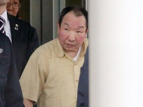 Former boxer Iwao Hakamada, 78, who has been on death row in Japan for 48 years, is released from a Tokyo detention center on March 27, 2014.  Hakamada, believed to be the world's longest-serving death row inmate, was granted a retrial on March 27 after decades in solitary confinement, in a rare about-face for Japan's rigid justice system.    JAPAN OUT     AFP PHOTO / JIJI PRESS    JIJI PRESS/AFP/Getty Images