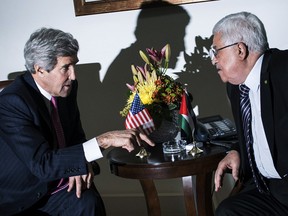 U.S. Secretary of State John Kerry meeting with Palestinian President Mahmoud Abbas in January 2014. For the Palestinians, the biggest obstacle to a peace deal is a new demand that they accept Israel as a Jewish state, an Abbas aide says.