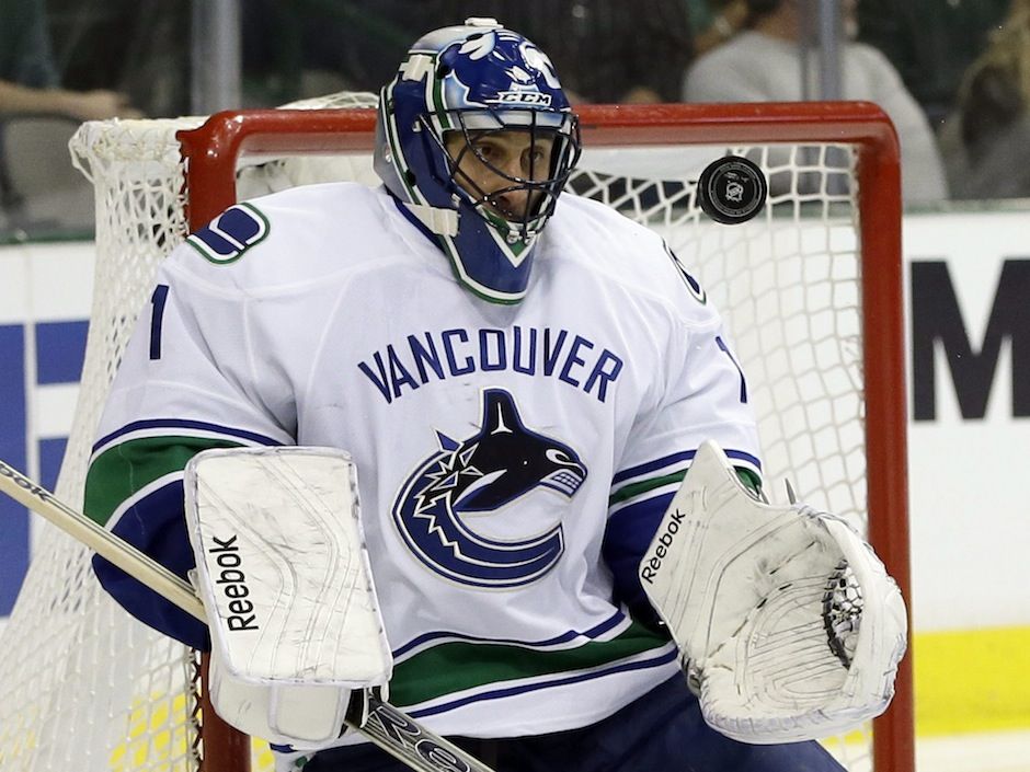 Vancouver Canuck Roberto Luongo shooting for Olympic gold