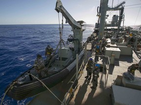 AFP PHOTO/AUSTRALIAN DEFENCE/CPOIS DAVID CONNOLLY