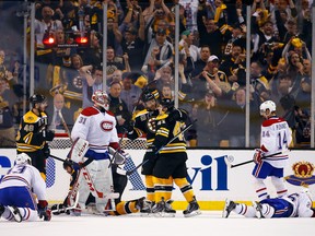 BOSTON, MA - MAY 14:  Jarome Iginla #12 of the Boston Bruins celebrates a second period goal with Torey Krug #47 against the Montreal Canadiens during Game Seven of the Second Round of the 2014 NHL Stanley Cup Playoffs at the TD Garden on May 14, 2014 in Boston, Massachusetts.  (Photo by Jared Wickerham/Getty Images)