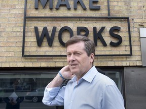 TORONTO, ONTARIO: MAY 8, 2014-- MAKE WORK -- Toronto Mayoral candidate John Tory visited the Make Works technology workspace for a tour, Thursday May 8, 2014.  [Peter J. Thompson/National Post]    [For Toronto story by Natalie Alcoba/Toronto] //NATIONAL POST STAFF PHOTO