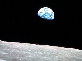 Apollo 8 astronauts took this photo of the Earth while on the Moon. Scientists say the Moon was created when the Earth collided with another planet 4.5 billion years ago.