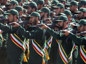 Members of Iran's elite Revolutionary Guards marching in Sept. 2103.