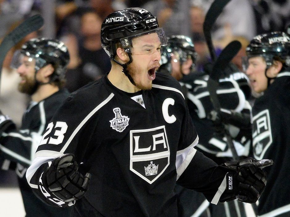 The la kings visiting players bench includes captain dustin brown