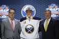 Sam Reinhart stands with Buffalo Sabres officials after being chosen second overall during the first round of the NHL hockey draft, Friday, June 27, 2014, in Philadelphia. (AP Photo/Matt Slocum)