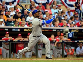 MINNEAPOLIS, MN - JULY 15: National League All-Star Yasiel Puig #66 of the Los Angeles Dodgers bats against the American League All-Stars during the 85th MLB All-Star Game at Target Field on July 15, 2014 in Minneapolis, Minnesota.  (Photo by Rob Carr/Getty Images)